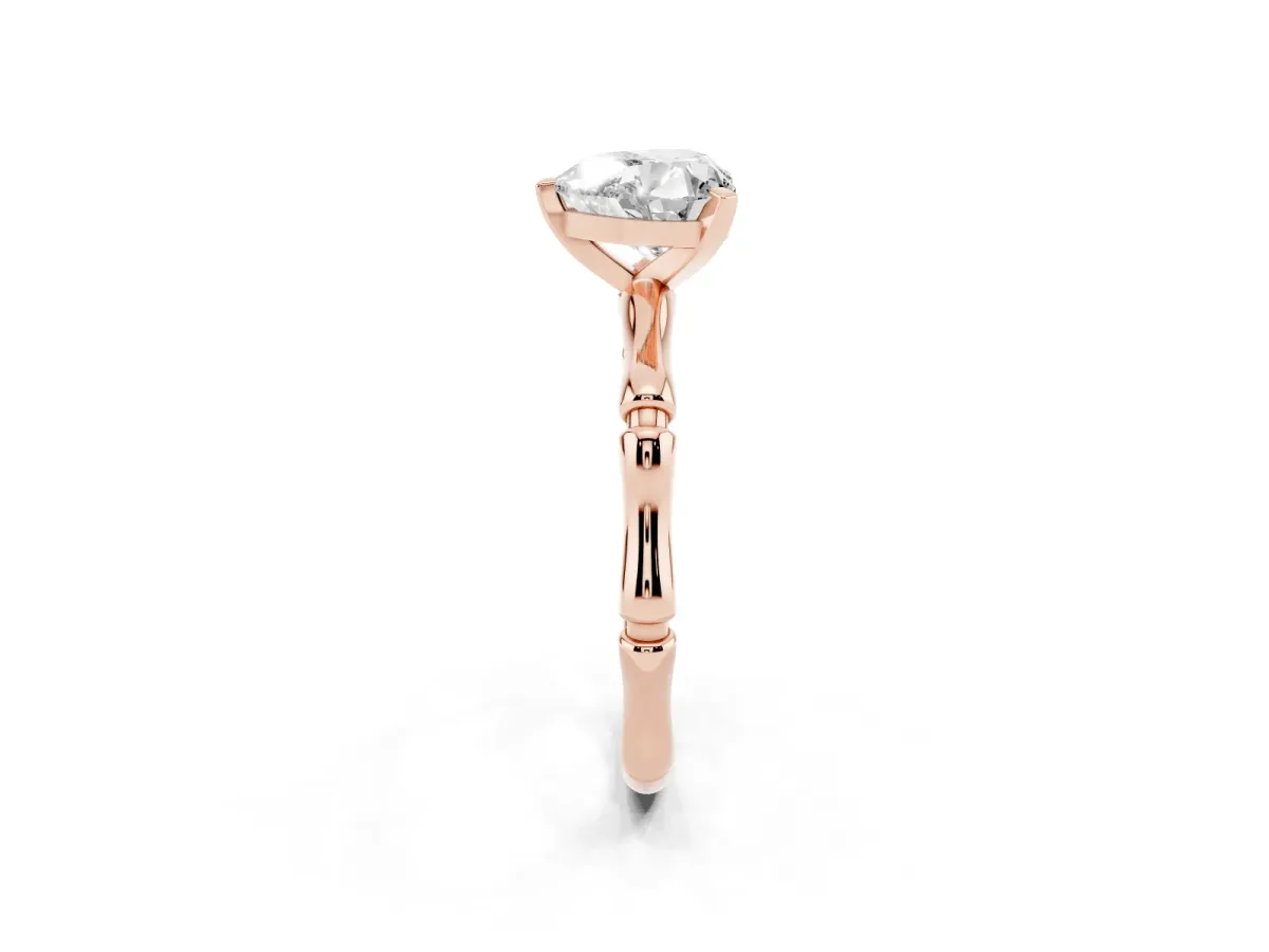 Heart Cut Solitaire Diamond Ring with Bamboo Band and Four-Prong Setting Rose gold