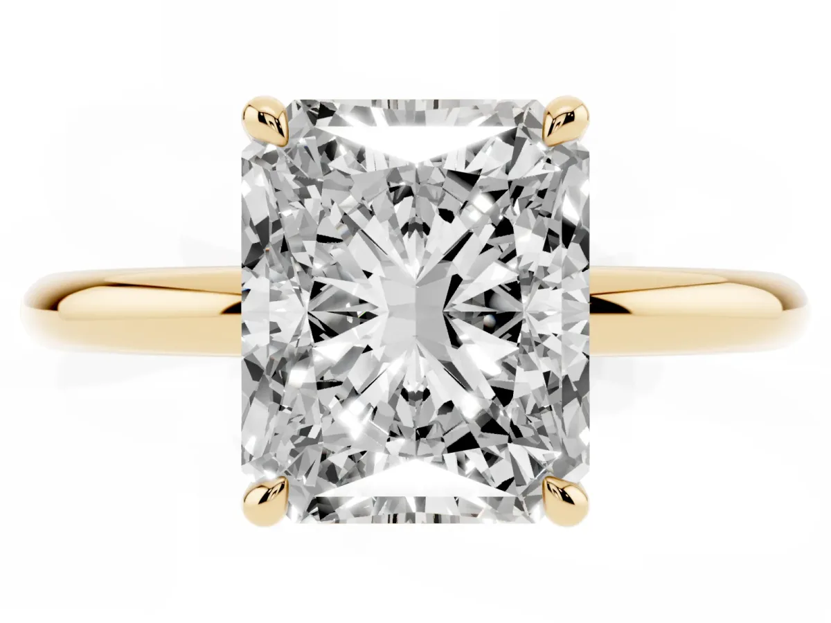 Radiant Cut Diamond Solitaire Ring with Thin Band and Four-Prong Setting Yellow gold