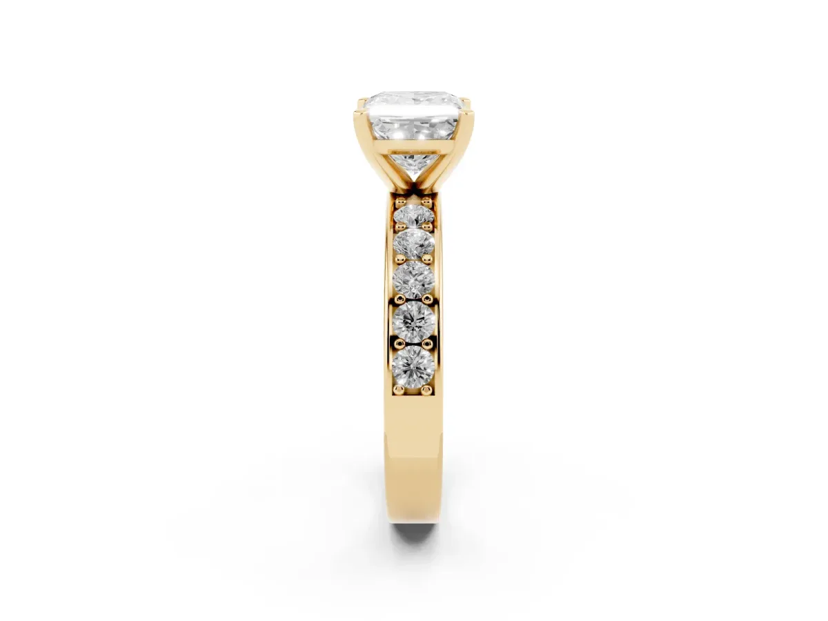 Princess Cut Diamond Engagement Ring with Channel Set Round Band and Prong Setting Yellow gold