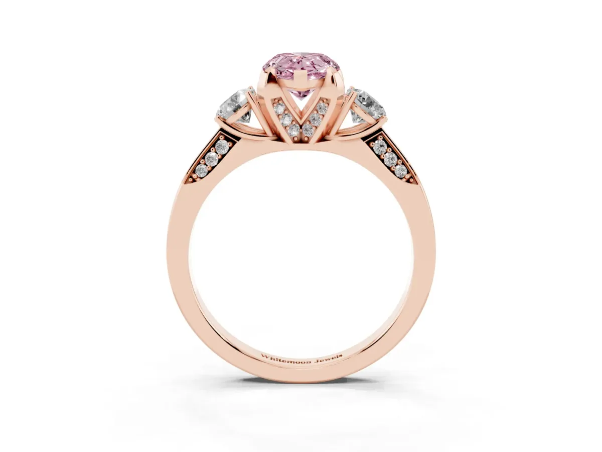 Fancy Pink Pear Cut Brilliant Three-Stone Diamond Ring with Pavé Band and Four-Prong Setting Rose gold