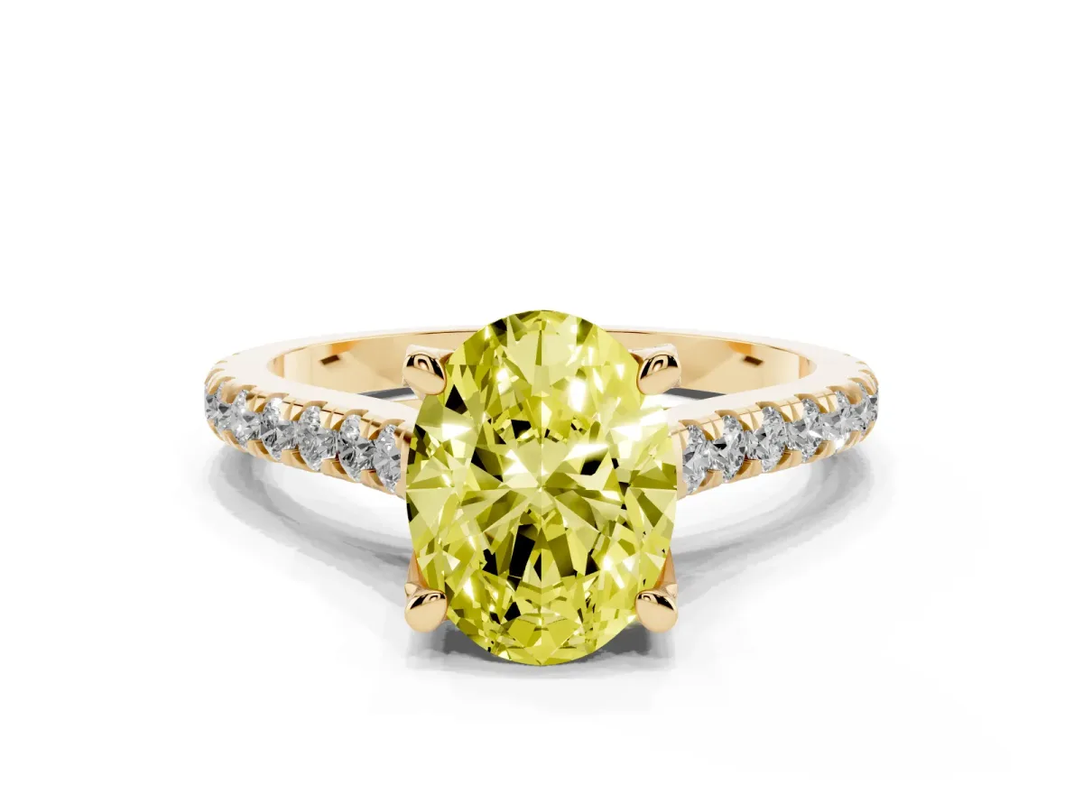 Fancy Yellow Oval Cut Brilliant Diamond Solitaire with Pavé Band and Four-Prong Setting Yellow gold