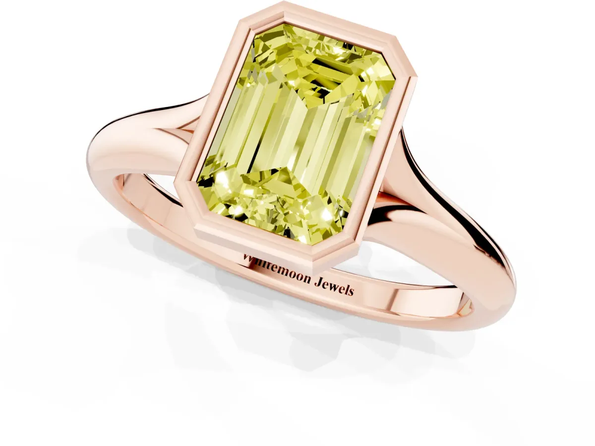 Fancy Yellow Bezel Set Emerald Cut Solitaire Diamond Ring with Smooth Band Rose gold