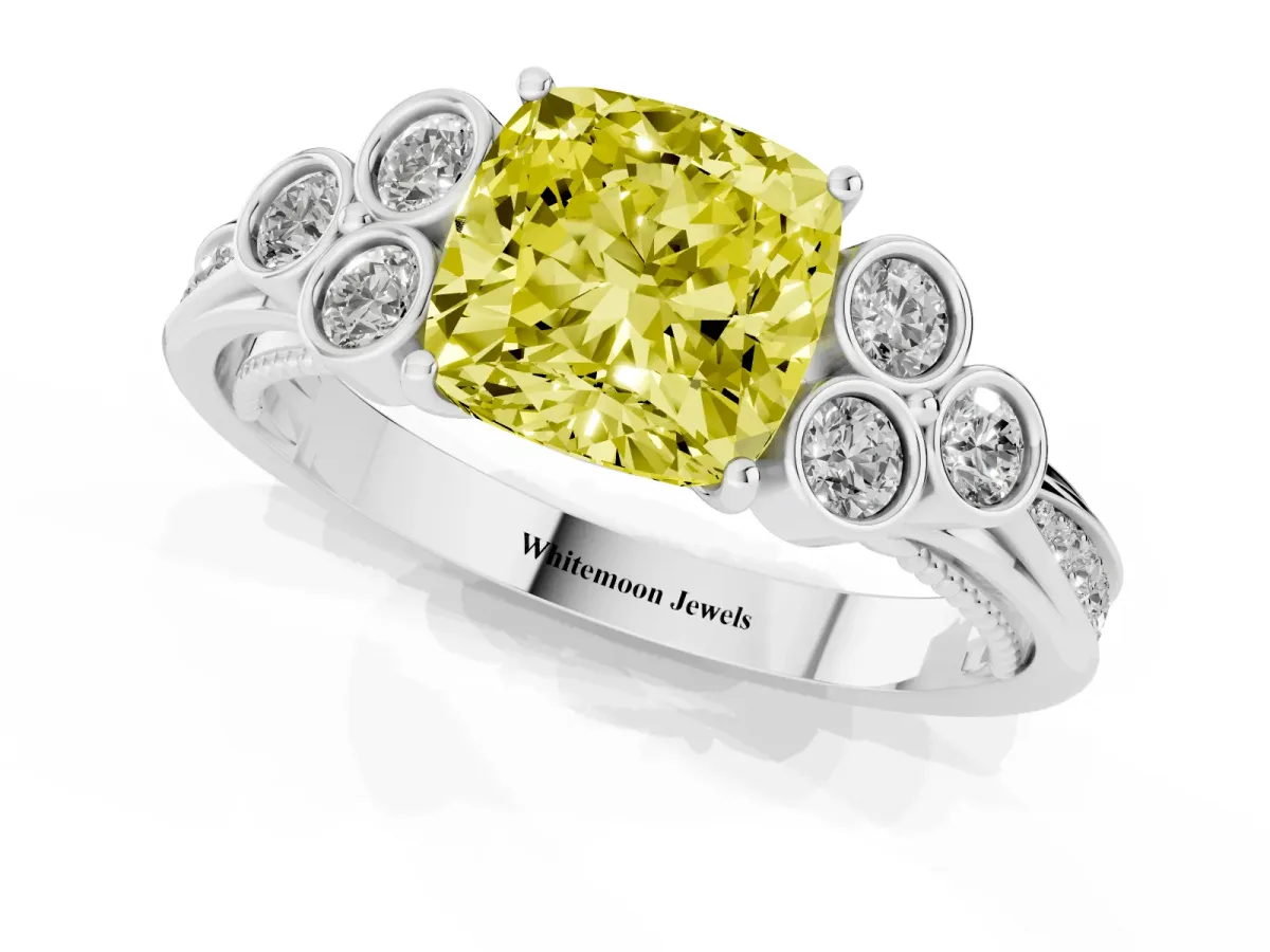 Fancy Yellow Cushion Cut Cut Diamond Engagement Ring with Bezel Set Round Side Stones and Prong Setting Platinum
