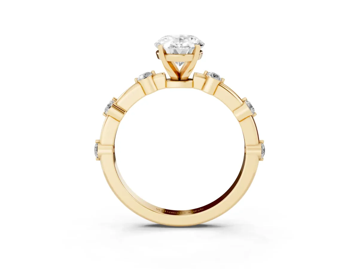Oval Cut Solitaire Diamond Ring with Bezel Set Side Stones and Prong Setting Yellow gold