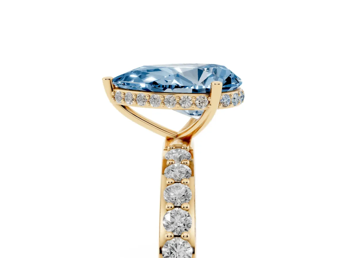 Fancy Blue Pear Cut Diamond Solitaire Ring with Pavé Band and Hidden Halo Yellow gold
