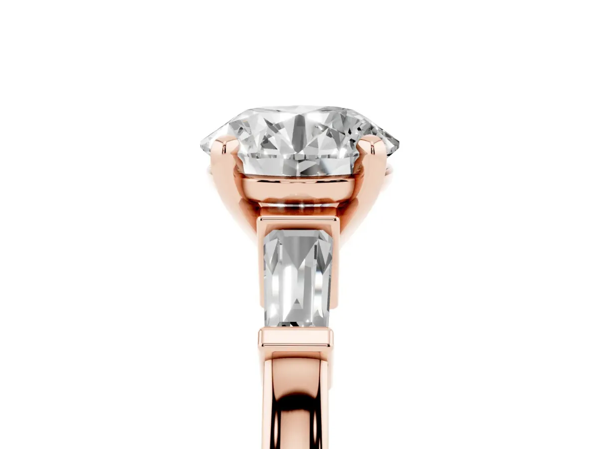 Round Cut Cut Diamond Solitaire Ring with Tapered Baguette Accents and Four-Prong Setting Rose gold