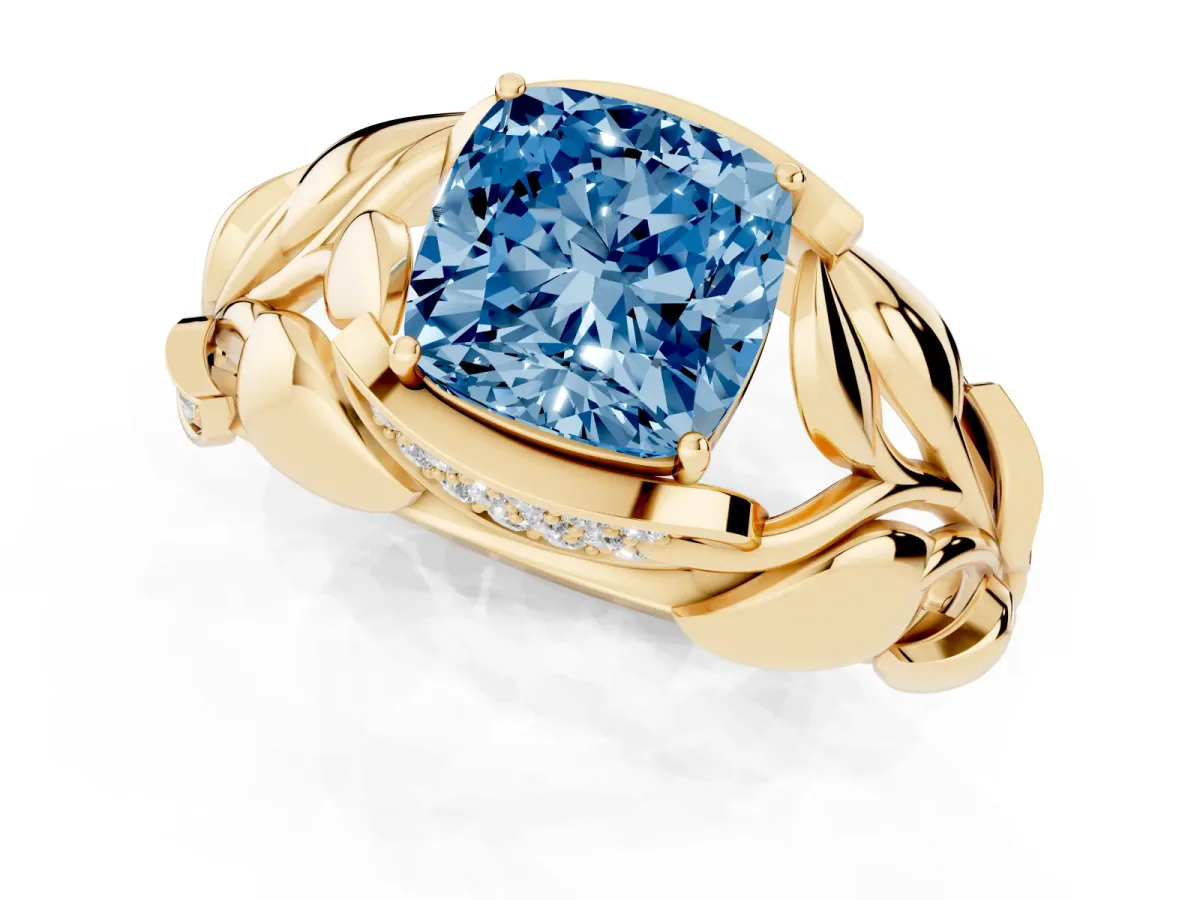 Fancy Blue Cushion Cut Diamond Leaf-Inspired Engagement Ring with Round Accents and Prong Setting Yellow gold