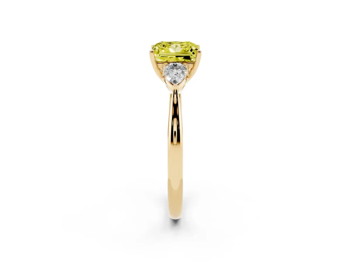 Fancy Yellow Three-Stone Princess Cut Diamond Ring with Pear Side Stones in Four-Prong Setting Yellow gold
