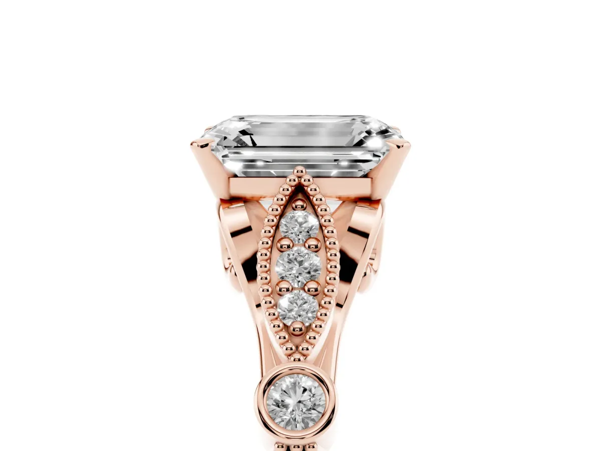 Emerald Cut Cut Diamond with Milgrain Marquise and Bezel Accents on a Solitaire Band with Prong Setting Rose gold