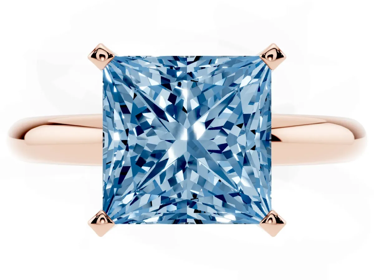Fancy Blue Princess Cut Diamond Solitaire Engagement Ring with Round Band and Four-Prong Setting Rose gold