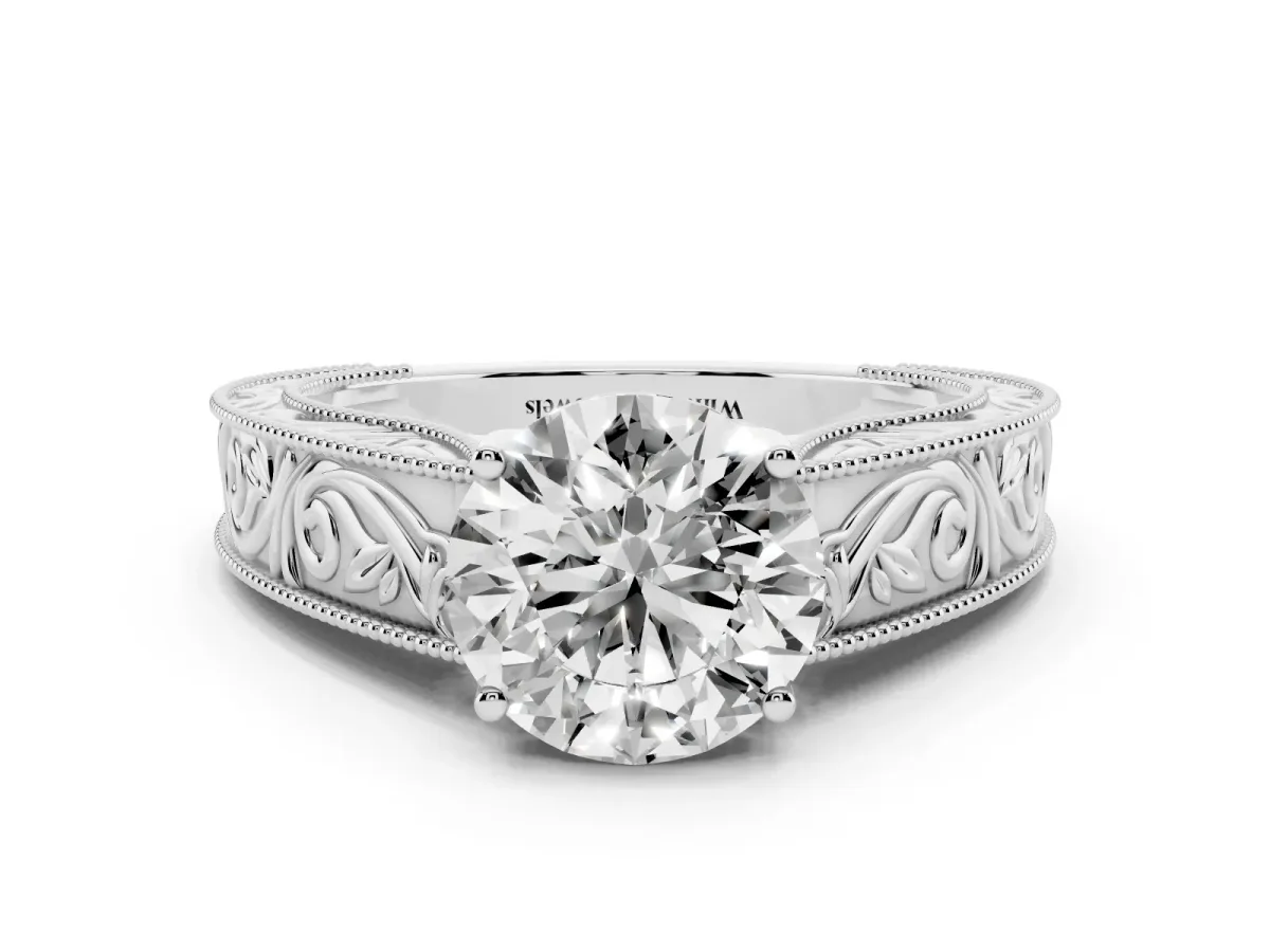 Round Cut Diamond Solitaire Ring with Engraved Band and Four-Prong Setting White gold