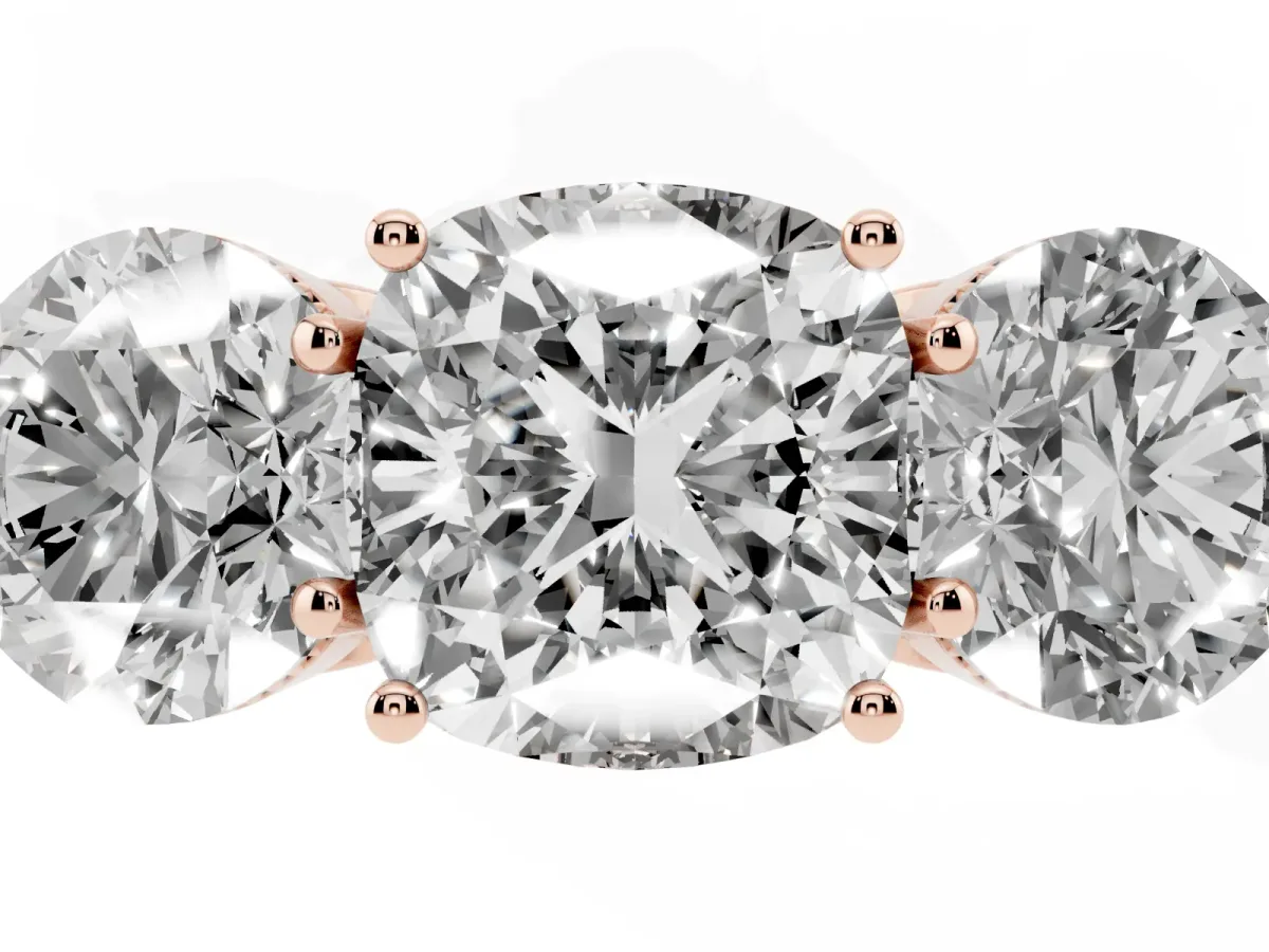 Three-Stone Cushion Cut Diamond Engagement Ring with Prong Setting on a Classic Band Rose gold