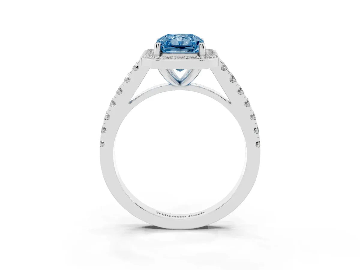 Fancy Blue Radiant Cut Diamond Halo Ring with Round Pavé Split Shank and Prong Setting Silver