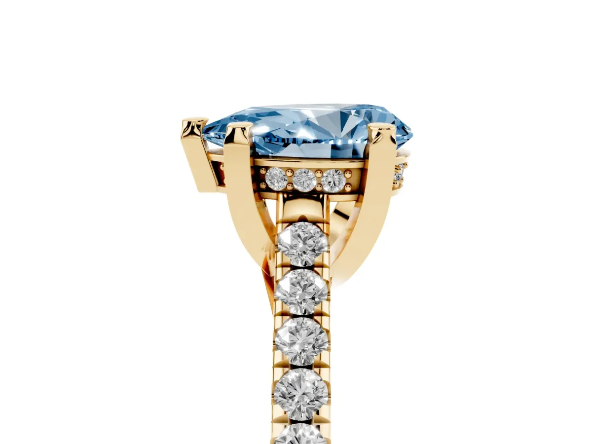 Fancy Blue Pear Cut Brilliant Diamond Solitaire with Pavé Band and Four-Prong Setting Yellow gold