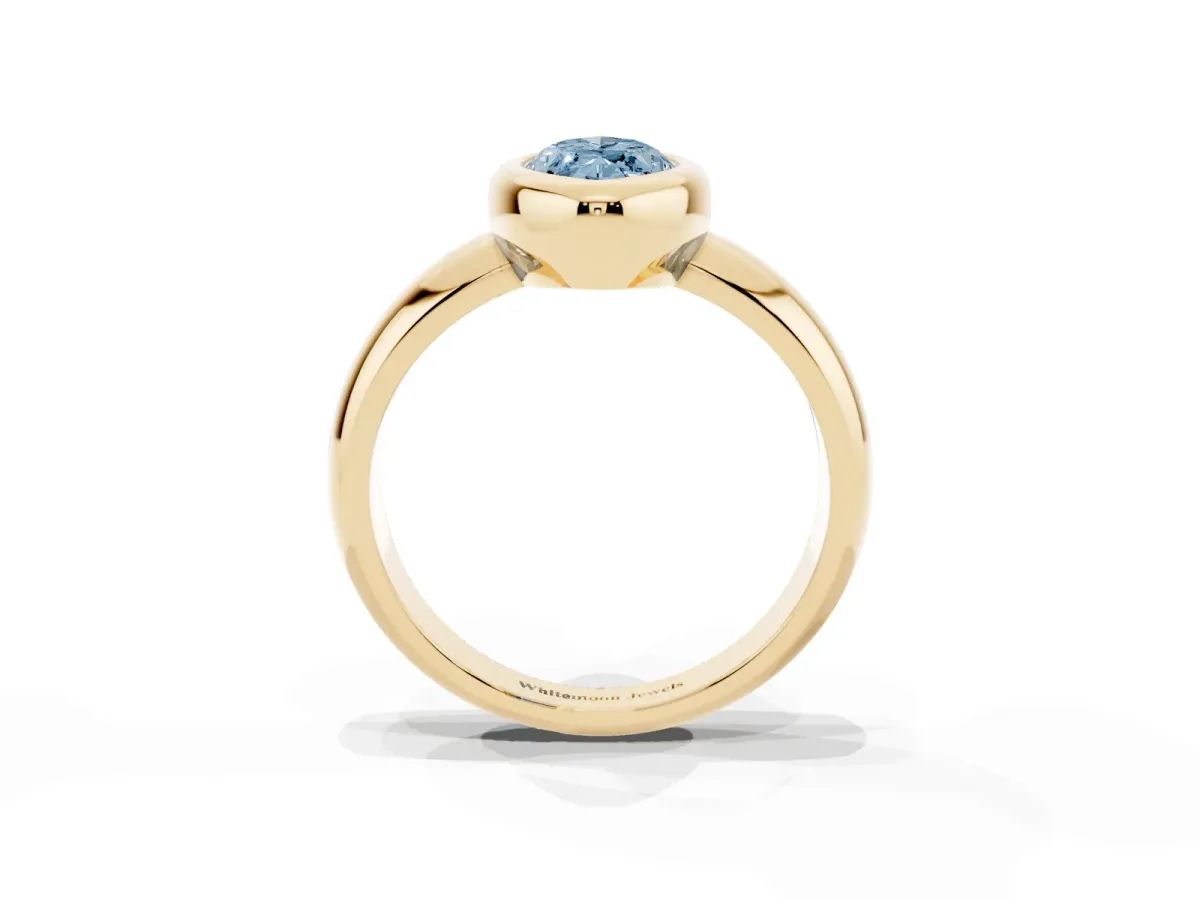 Fancy Blue Bezel Set Marquise Cut Solitaire Ring with Wide Band Yellow gold