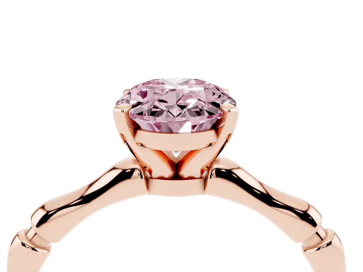 Fancy Pink Oval Cut Solitaire Diamond Ring with Bamboo Band and Four-Prong Setting Rose gold