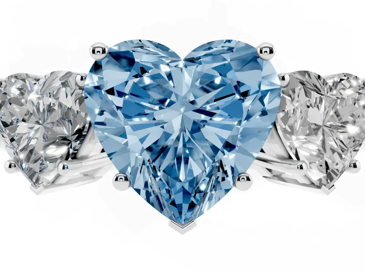 Fancy Blue Three-Stone Heart Cut Cut Diamond Engagement Ring with Flat Band and Four-Prong Setting Silver