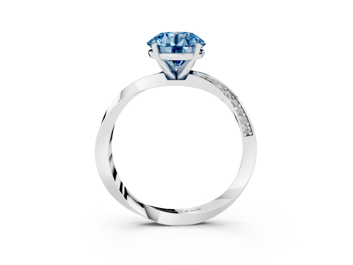 Fancy Blue Round Cut Diamond Engagement Ring with Side Stone Accents and Four-Prong Setting Silver