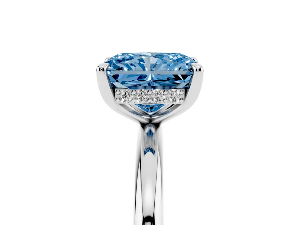 Fancy Blue Radiant Cut Diamond Solitaire Ring with Thin Band and Four-Prong Setting Silver