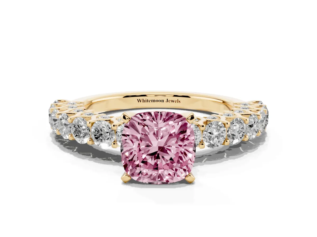 Fancy Pink Cushion Cut Diamond Solitaire Ring with Shared Prong Pavé Band and Four-Prong Setting Yellow gold