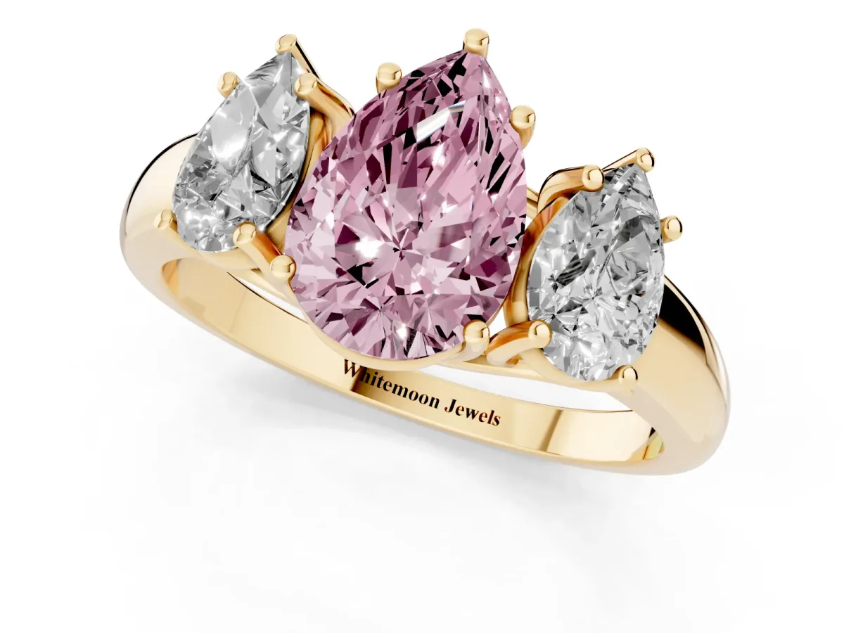 Fancy Pink Three-Stone Pear Cut Diamond Engagement Ring with Prong Setting Yellow gold