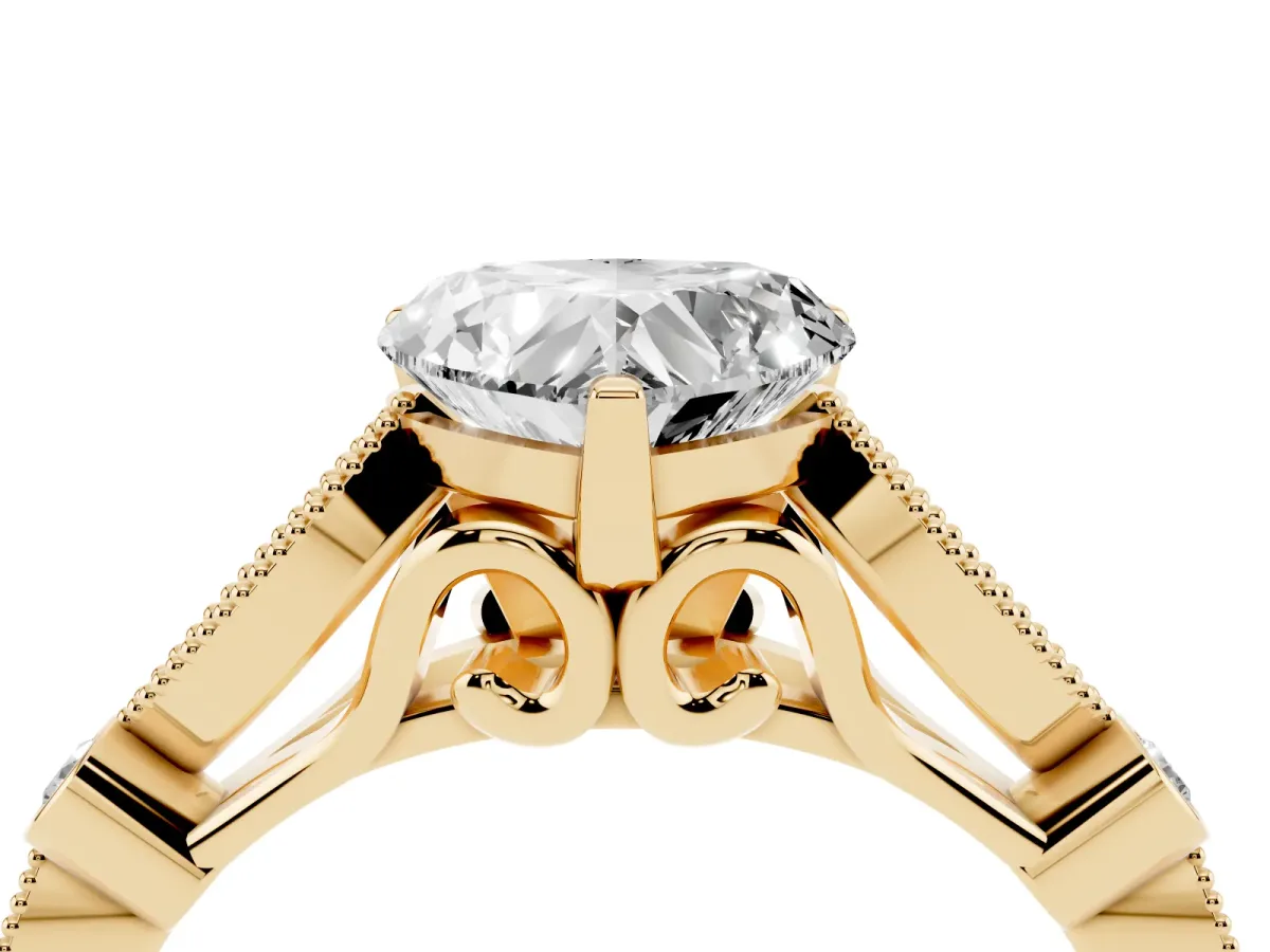 Heart Cut Cut Diamond with Milgrain Marquise and Bezel Accents on a Solitaire Band with Prong Setting Yellow gold