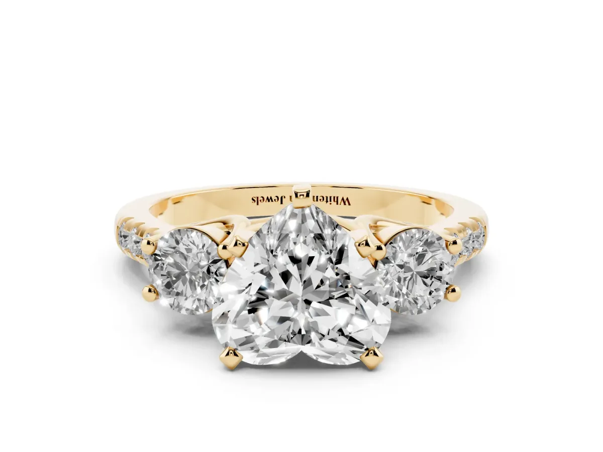 Three-Stone Heart Cut Diamond Pavé Band with Four-Prong Setting Yellow gold