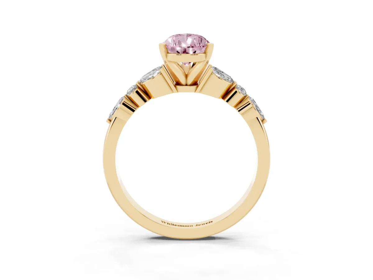 Fancy Pink Pear Cut Diamond Solitaire Ring with Side Stones and Four-Prong Setting Yellow gold