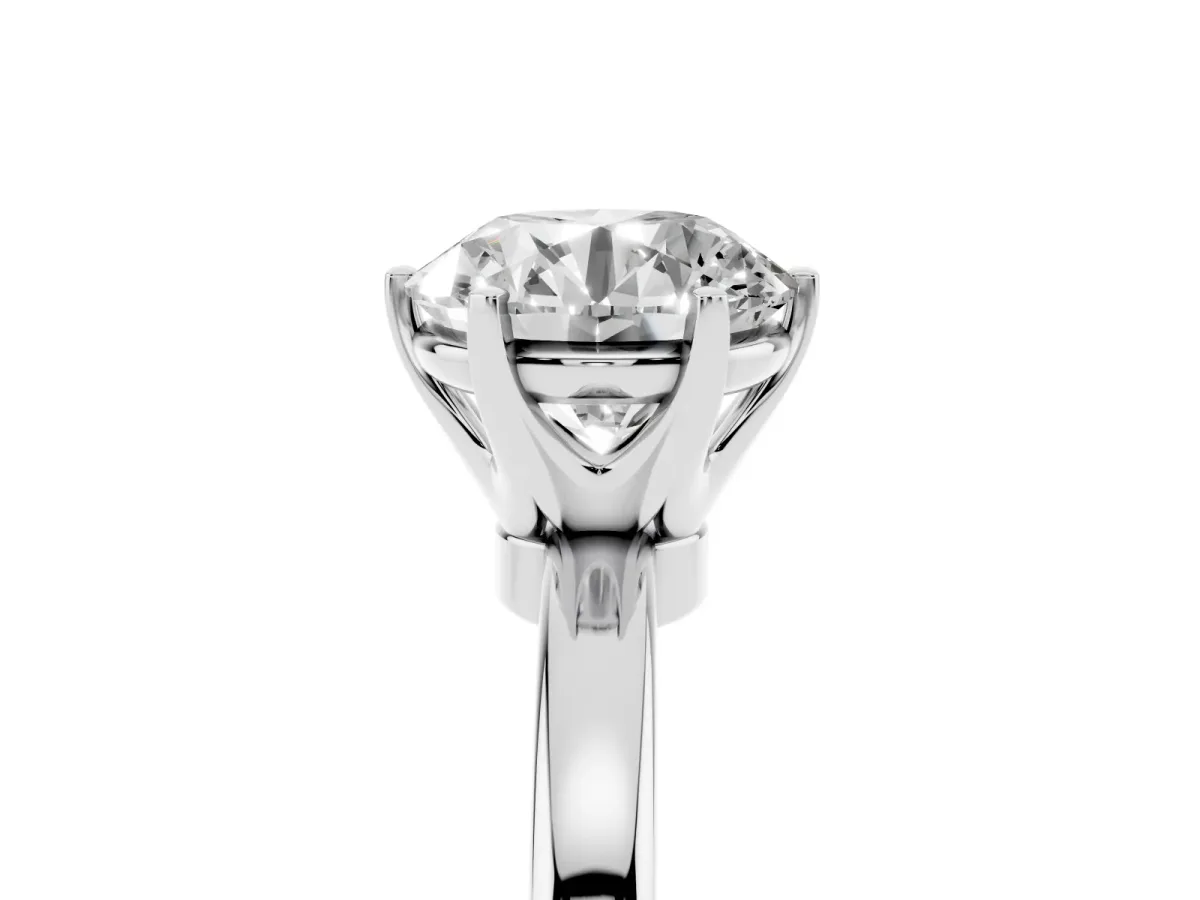 Round Cut Solitaire Diamond Ring with Six-Prong Setting on a Classic Band Silver