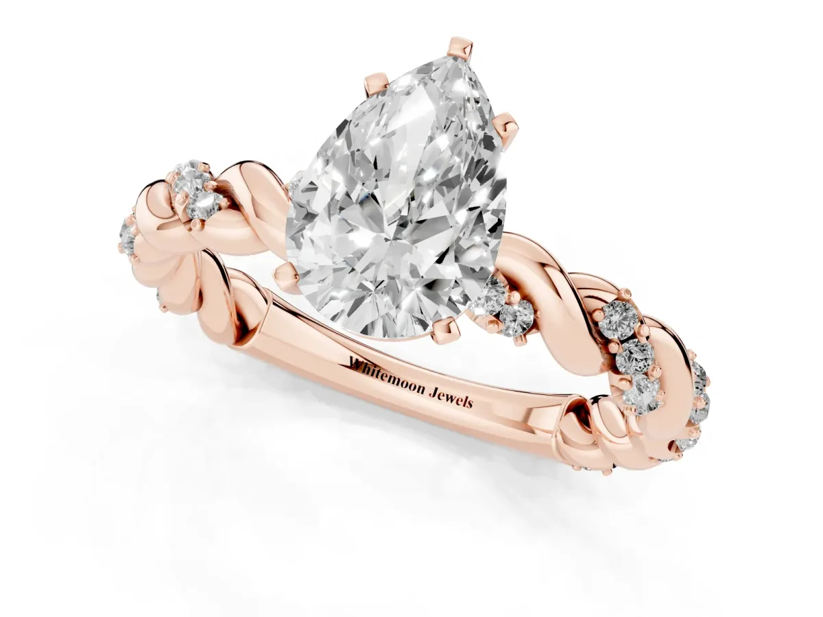 Pear Cut Diamond Solitaire Ring with Twisted Band and Pavé Accents Rose gold