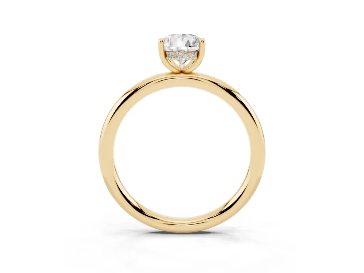 Pear Cut Diamond Solitaire Ring with Thin Band and Four-Prong Setting Yellow gold