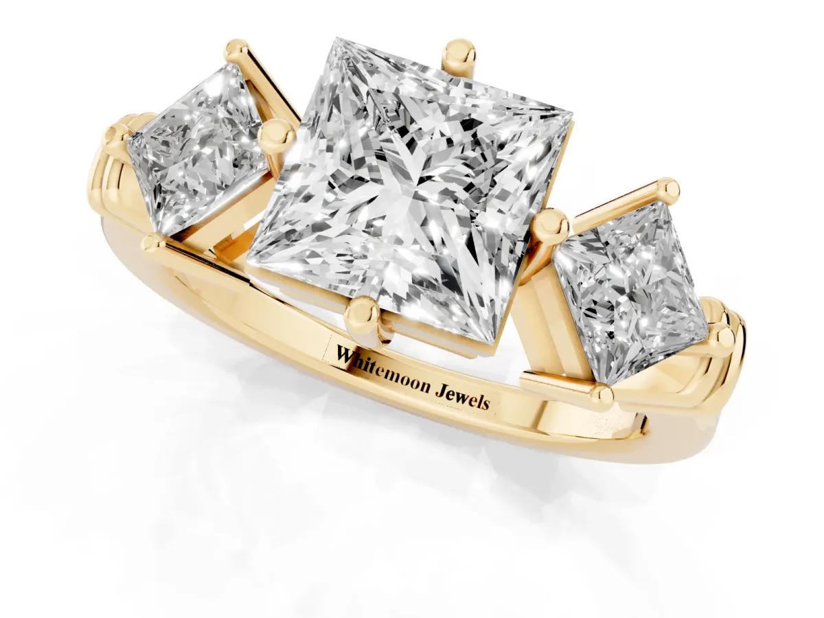 Three-Stone Princess Cut and Princess Cut Diamond Ring with Channel Band and Four-Prong Setting Yellow gold