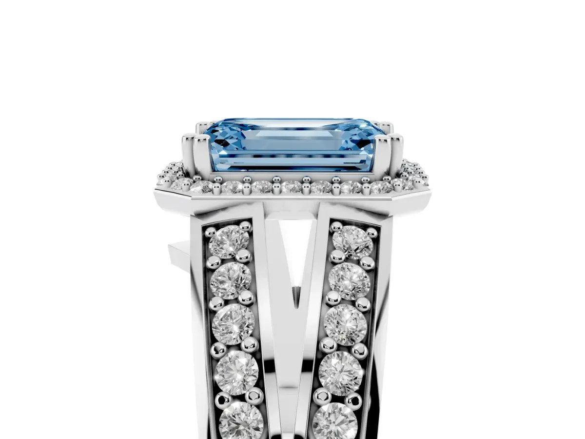 Fancy Blue Emerald Cut Diamond Halo Ring with Split Shank Pavé Band and Four-Prong Setting White gold
