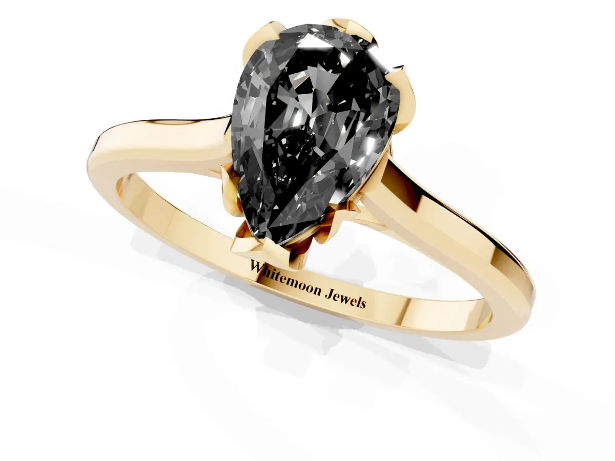 Fancy Black Pear Cut Diamond Solitaire Ring with Flower Prong Setting and Classic Band Yellow gold