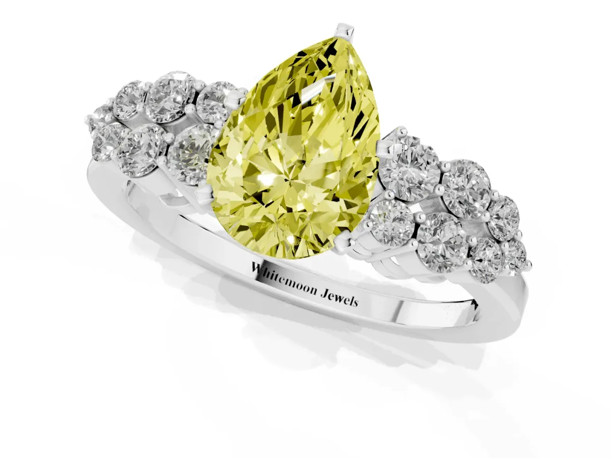 Fancy Yellow Pear Cut Cluster Diamond Engagement Ring with Pavé Band and Four-Prong Setting Platinum