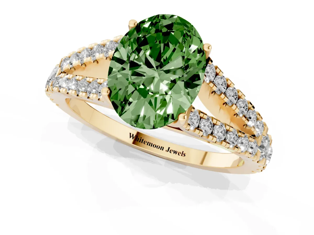 Fancy Green Oval Cut Diamond Split Shank Pavé Engagement Ring with Four-Prong Setting Yellow gold
