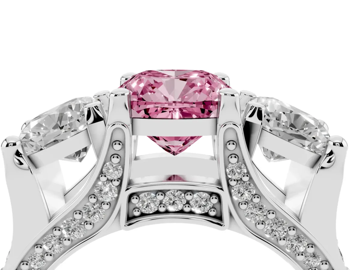 Fancy Pink Cushion Cut Diamond Three-Stone Ring with Channel Set Band and Four-Prong Setting Platinum