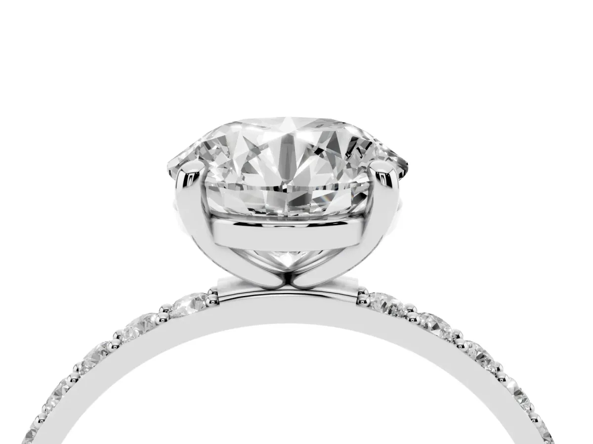 Round Cut Diamond Solitaire Ring with Round Pavé Band and Prong Setting Platinum