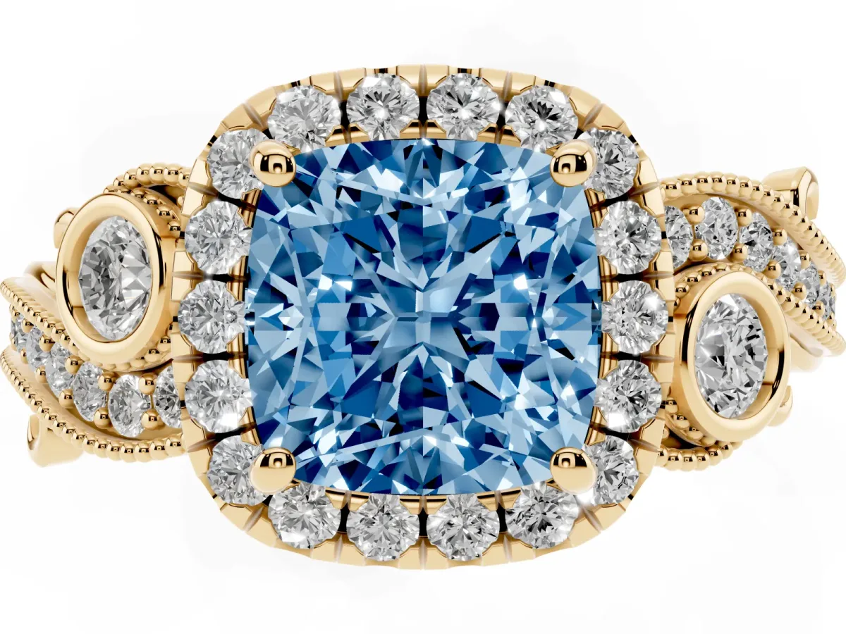 Fancy Blue Cushion Cut Diamond Halo Ring with Milgrain Pavé Band and Four-Prong Setting Yellow gold