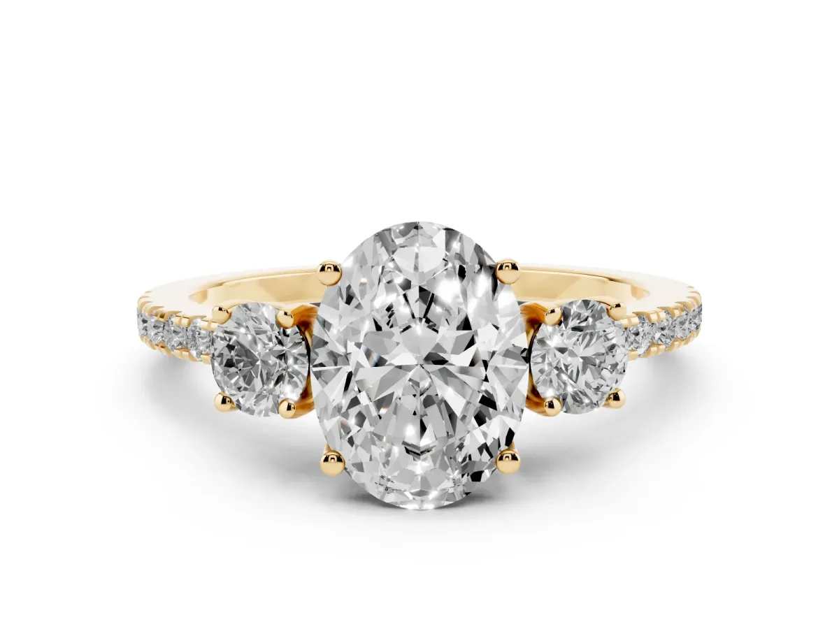Three-Stone Oval Cut Cut Diamond Pavé Band with Prong Setting Yellow gold