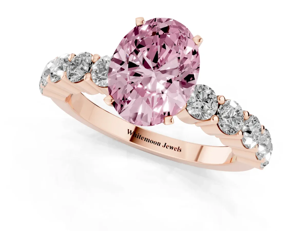 Fancy Pink Oval Cut Diamond Solitaire Ring with Shared Prong Round Side Stones Rose gold