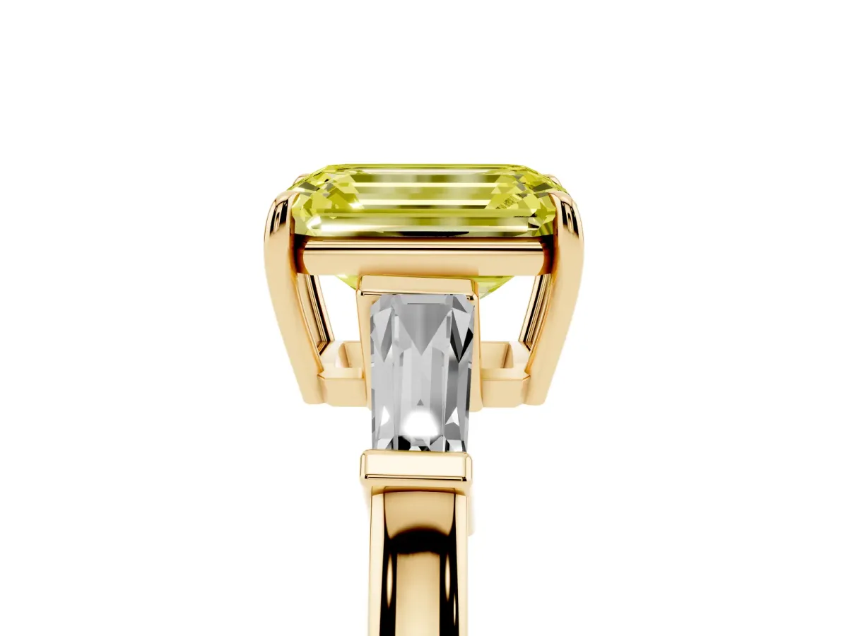 Fancy Yellow Emerald Cut Diamond Three-Stone Ring with Tapered Baguette Side Stones and Prong Setting Yellow gold