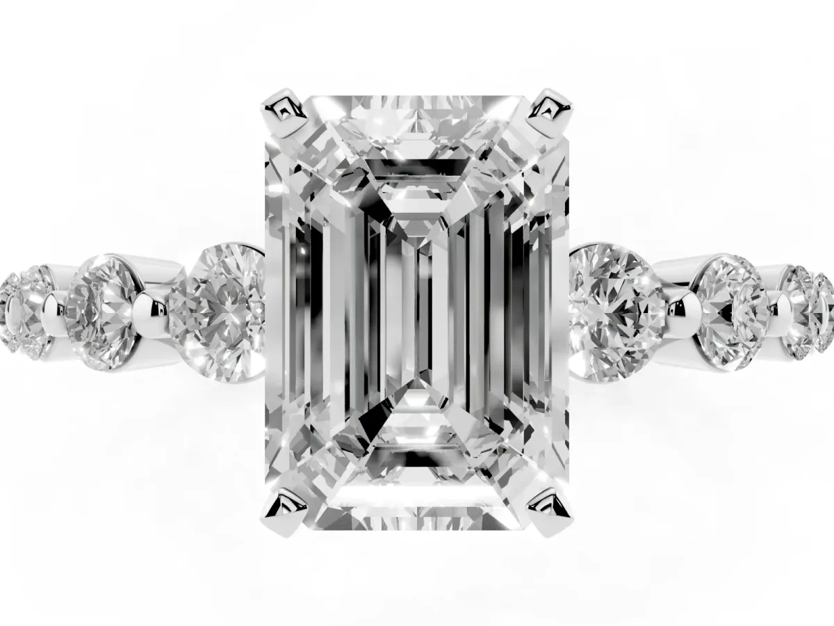 Emerald Cut Solitaire Diamond Ring with Pave Band and Four-Prong Setting Silver