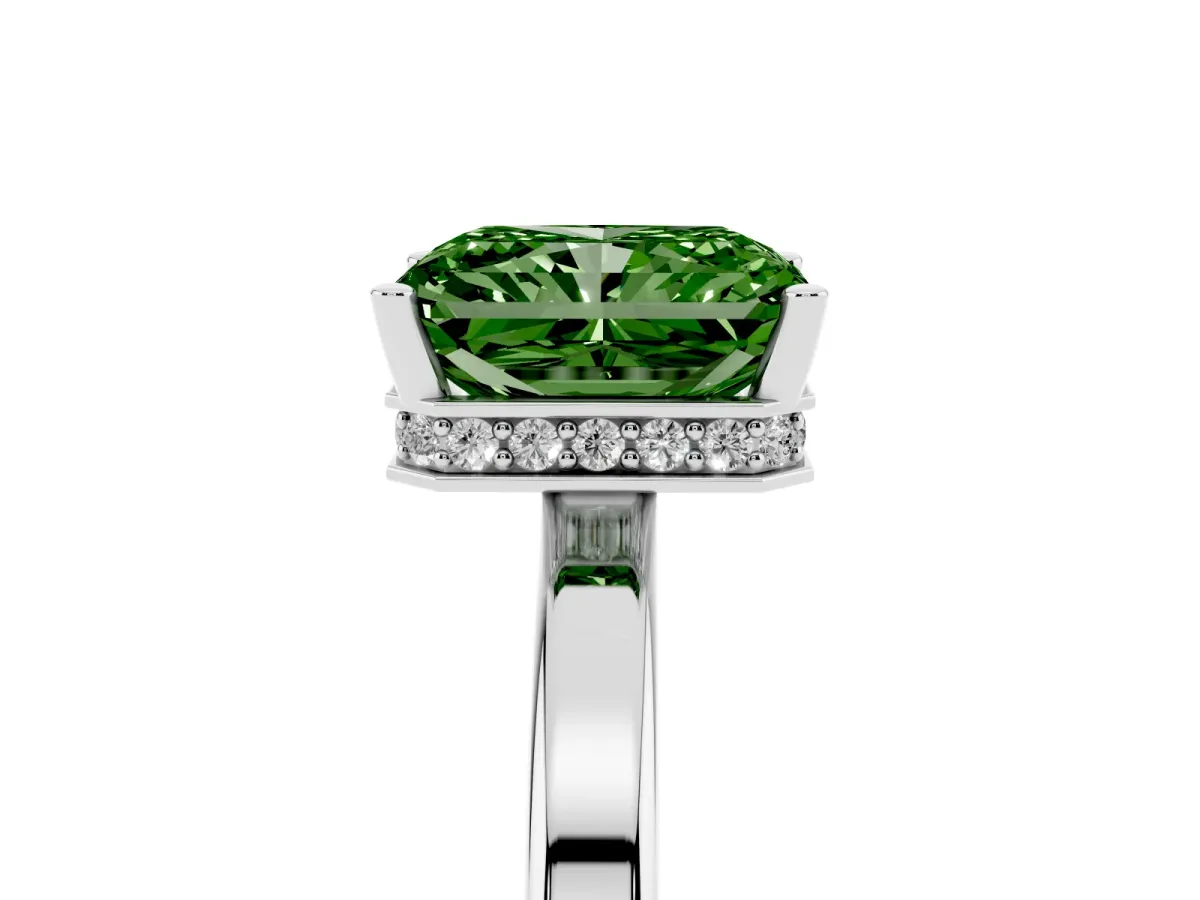 Fancy Green Radiant Cut Cut Solitaire Engagement Ring with Four-Prong Setting on a Classic Band Silver