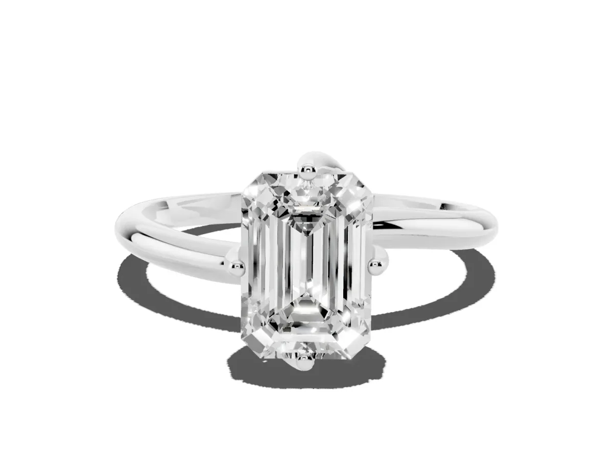 Emerald Cut Diamond Solitaire Engagement Ring with Four-Prong Setting and Classic Band Silver
