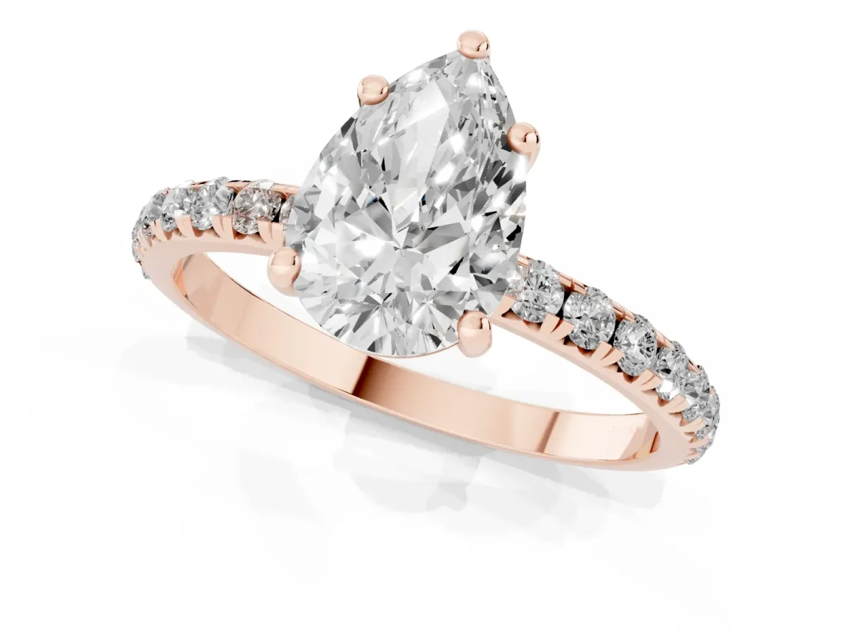 Pear Cut Cut Diamond Solitaire Ring with Micro Pave Band and Four Prong Setting Rose gold