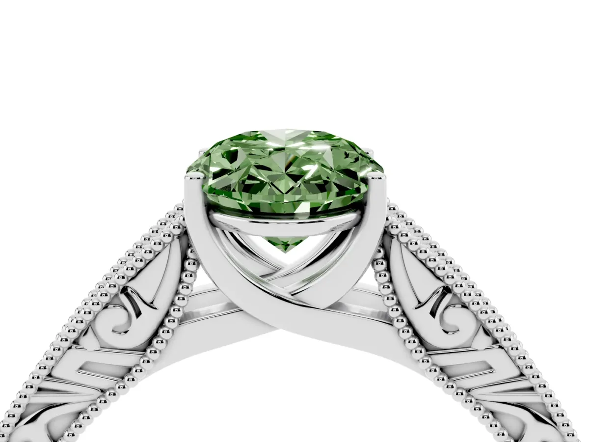 Fancy Green Oval Cut Diamond Solitaire Ring with Engraved Band and Four-Prong Setting Platinum