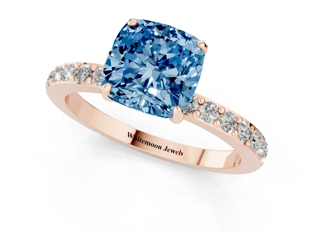 Fancy Blue Cushion Cut Diamond Pavé Engagement Ring with Round Accents and Prong Setting Rose gold