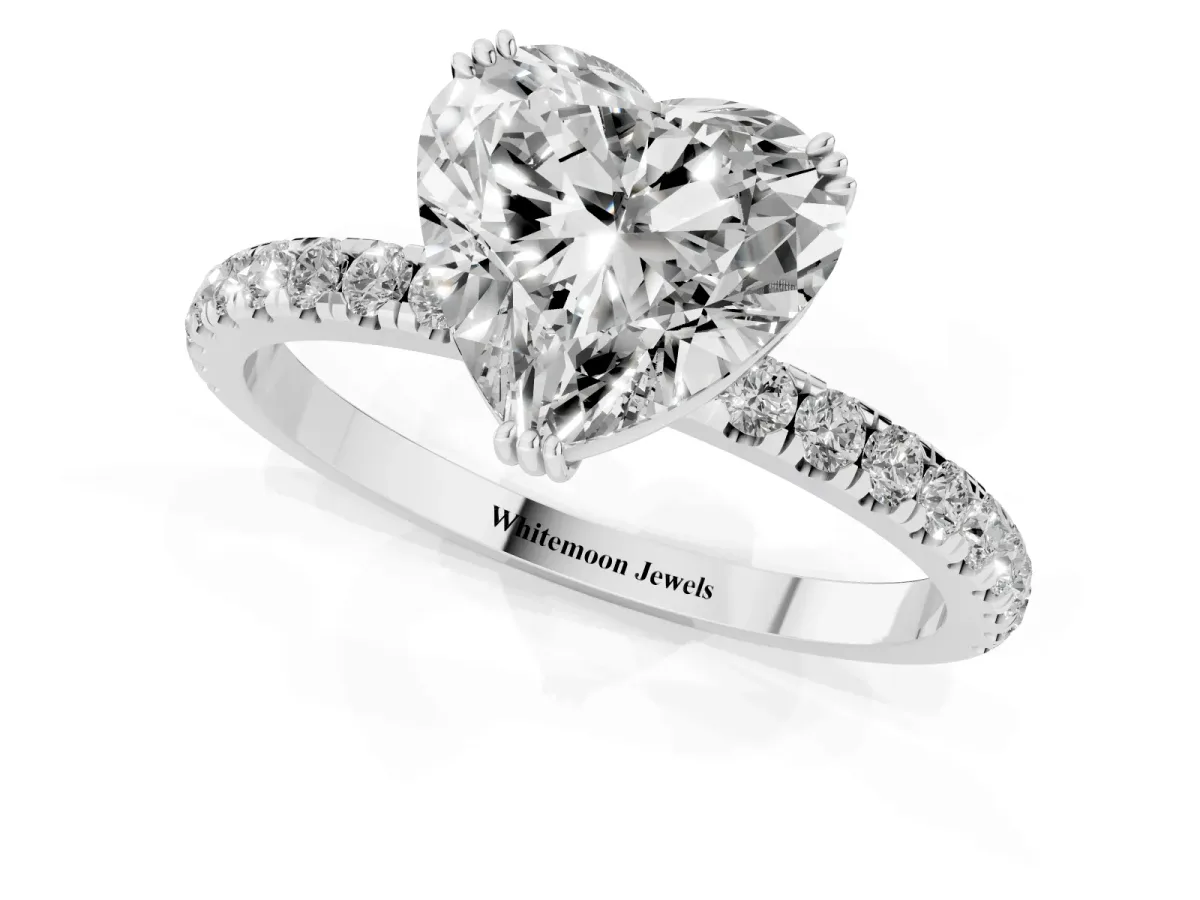 Heart Cut Brilliant Solitaire with Pavé Band and Claw Prong Setting Silver