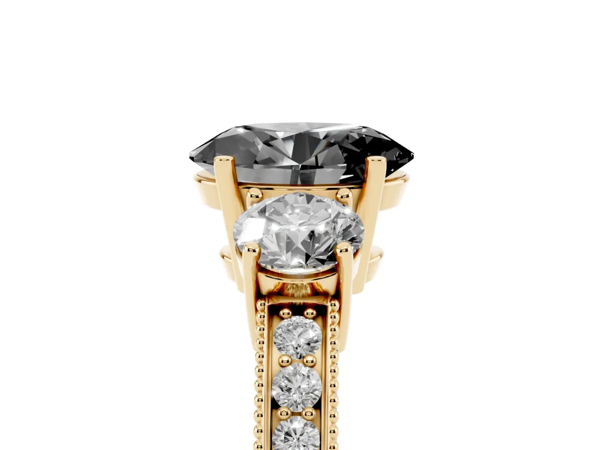 Fancy Black Oval Cut Three-Stone Diamond Ring with Pavé Band and Four-Prong Setting Yellow gold